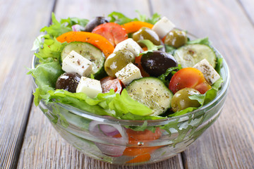Greek salad in glass dish
