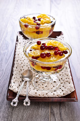 Dessert of orange slices and berries cranberries