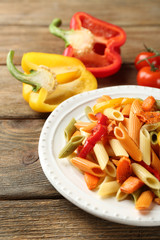 Pasta salad with pepper, carrot and tomatoes