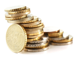 Pile of coins isolated on white