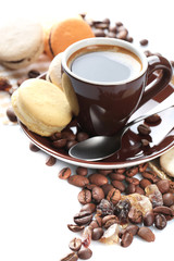 Gentle colorful macaroons and black coffee in mug isolated