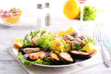 Seafood Paella on plate on table close-up