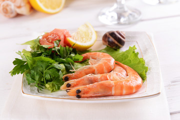 Tasty seafood on plate on table close-up