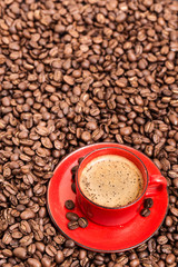 Red coffee cup and beans