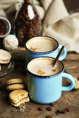 Beautiful composition with tasty cappuccino on wooden table