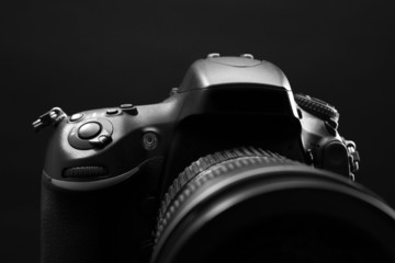 Digital camera on dark background