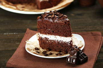 Delicious chocolate cake on table close-up