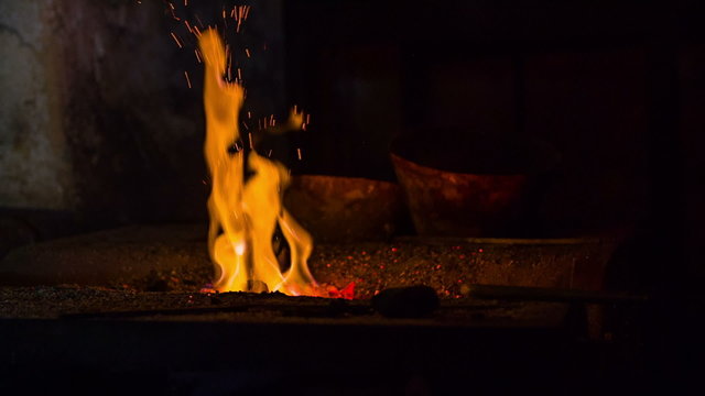 Fire in the blacksmith shop in the early modern period
