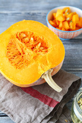 Half of raw pumpkin on napkin