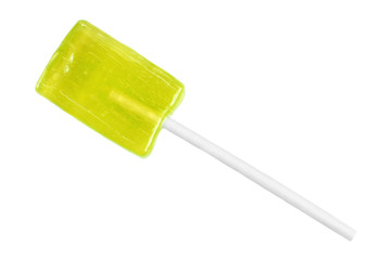 Yellow lollipop isolated on white background.