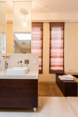 Bathroom in modern style in huge apartment