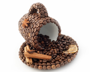 the cup made of coffee beans on the white background