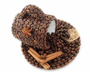 the cup made of coffee beans on the white background
