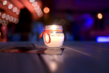 Romantic atmosphere with a candle on the table