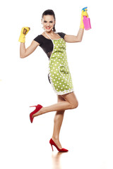 Happy young housewife posing on a white background