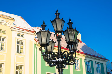 Fototapeta na wymiar Beautiful street lamp on the background of old buildings