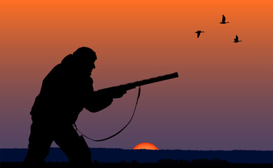 Fototapeta na wymiar hunter in the evening