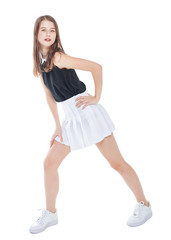 Fototapeta premium Young fashion girl in white skirt posing isolated