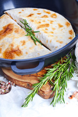Mexican tortilla with meat stuffing, corn and vegetable salsa