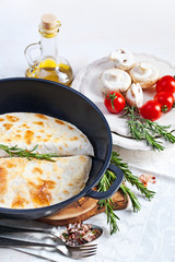 Mexican tortilla with meat stuffing, corn and vegetable salsa
