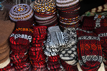 Knit slippers and embroidered skull-caps  Turkmenistan. Ashkhaba