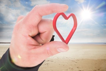 Composite image of businessmans fingers presenting