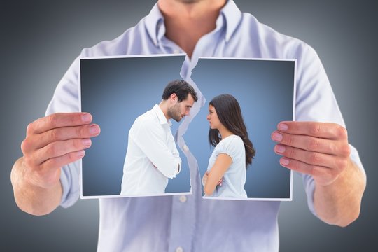 Composite image of angry couple facing off after argument