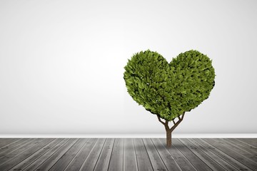 Composite image of heart shaped plant
