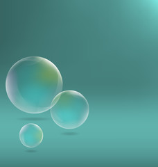Three transparent soap bubbles with shadows on cyan background
