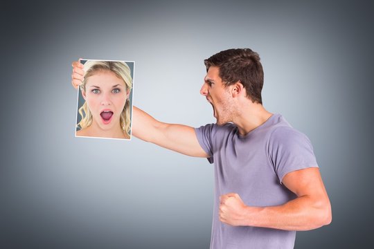 Composite image of shocked blonde holding a sheet of paper
