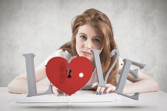 Composite image of pretty redhead typing on keyboard