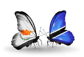 Two butterflies with flags Cyprus and Botswana