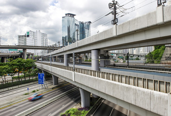 Highway and viaduct under the blue sky