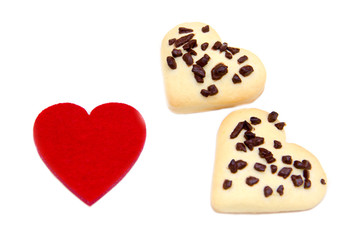 Cookies and little heart red on white background