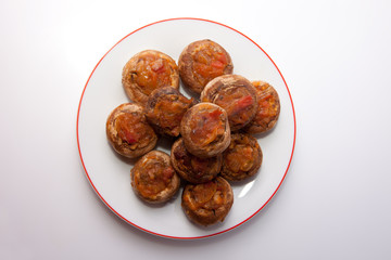 Mushrooms stuffed with fried vegetables