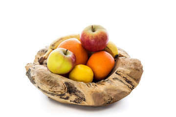 Wooden bowl with apples and citrus