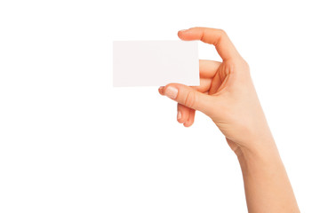 Fototapeta premium blank sheet of white paper in hand between fingers