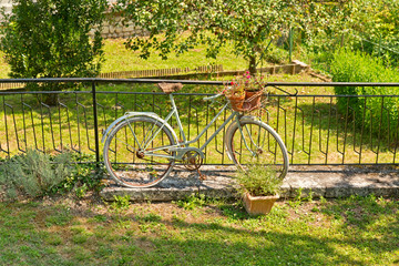Vintage Bicycle Leaning on Metallic Rail