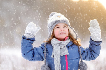 Funny little girl at winter
