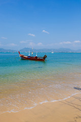 Fototapeta premium landscape the sea, the boat in a bay of a chalong