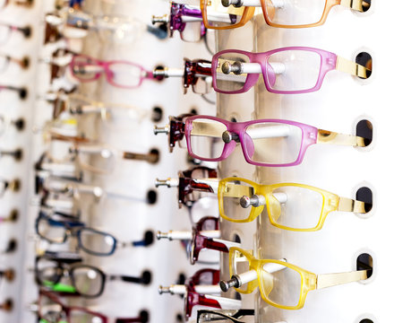 Eyeglasses hang on the wall.Fashion style in color and design.