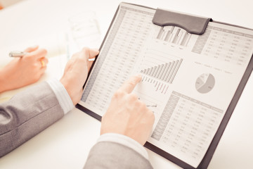 Fototapeta premium Business people discussing the charts and graphs showing the res