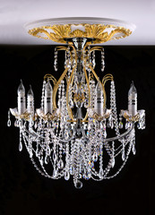 Classical style chandelier on ceiling