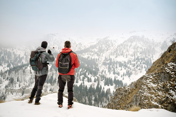 Hikers admiring the winter landscape