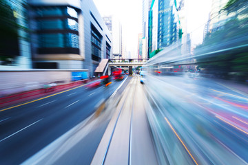 Naklejka premium traffic blur motion in modern city hongkong