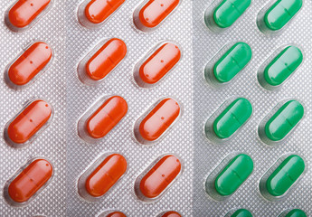 Orange-green pills background