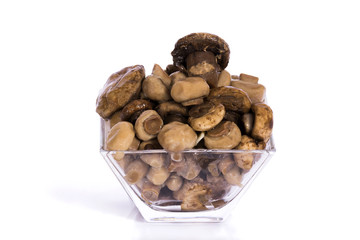 Marinated mushrooms in a glass