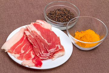 Pieces of bacon and spices