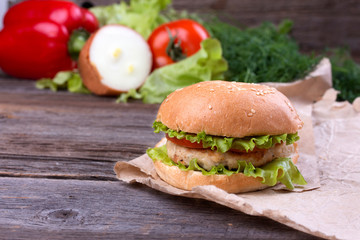 Delicious homemade hamburger on wood