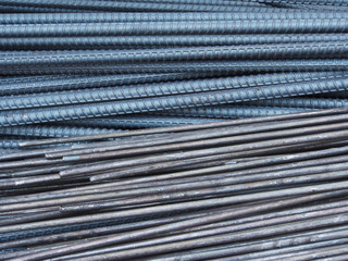 Steel rods or bars used to reinforce concrete